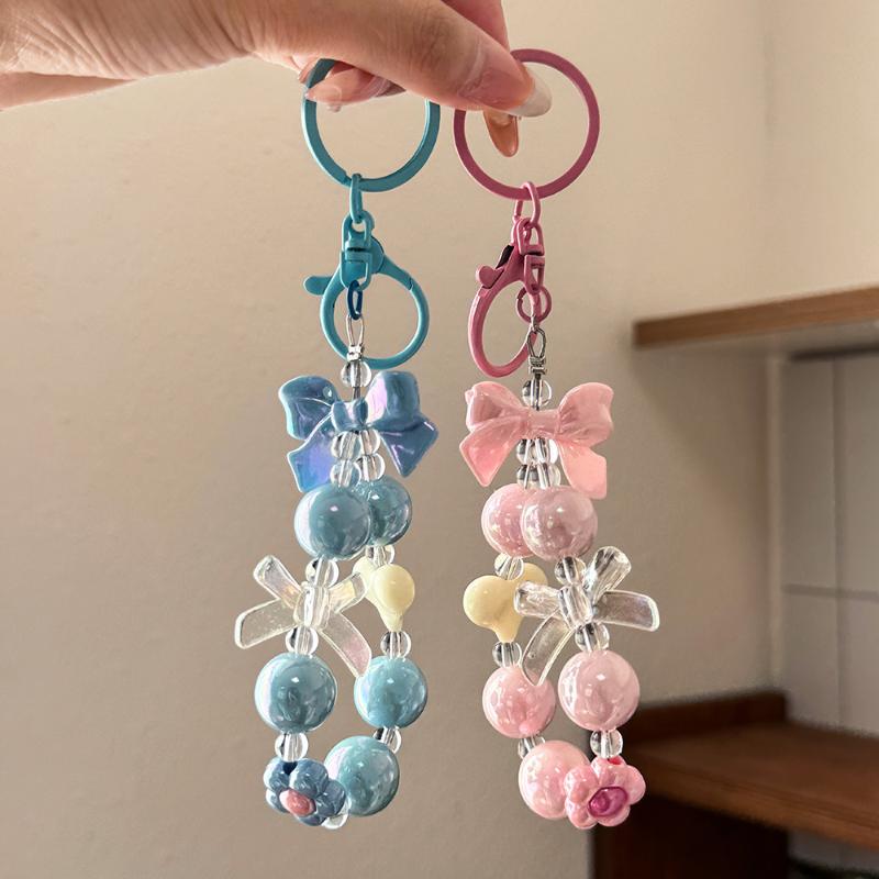 NEW Candy Color Heart Bow Bead - đánh giá và giá Phone Accessories For Teen Girls